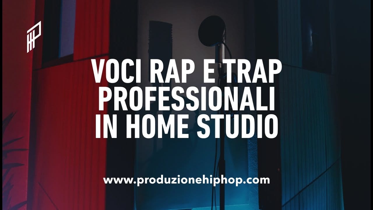 Simone al mixer mentre lavora su una voce rap in studio